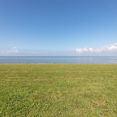 Apartment N14 Direkt Am Nordseedeich Mit Blick Auf Den See Nordstrand Esterno foto